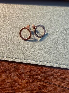 Open circle guilloche cut 14 k Italian rose gold studs